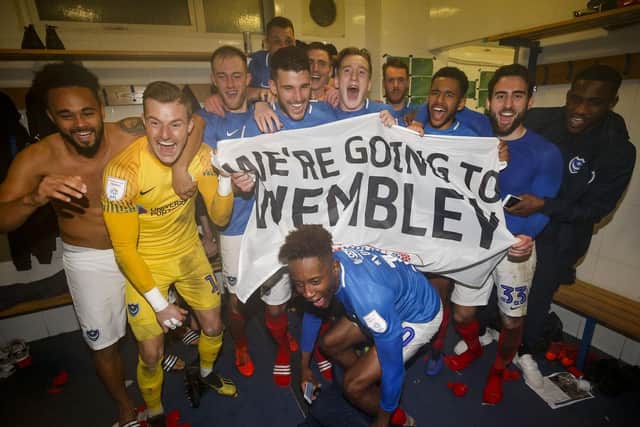 Portsmouth celebrate in the changing room after winning the Checkatrade Trophy Semi Final match between Bury and Portsmouth at Gigg Lane on February 26th 2019 in Bury, England. (Photo by Daniel Chesterton/phcimages.com)