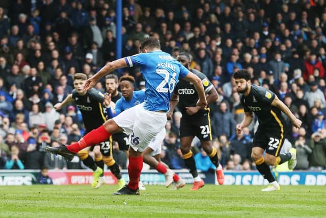 Gareth Evans fires Pompey ahead from the penalty spot against Bradford. Picture: Joe Pepler