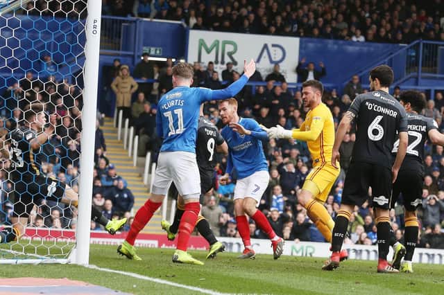 Anthony O'Connor can only watch on as Tom Naylor scores for Pompey against Bradford at Fratton Park. Picture: Joe Pepler