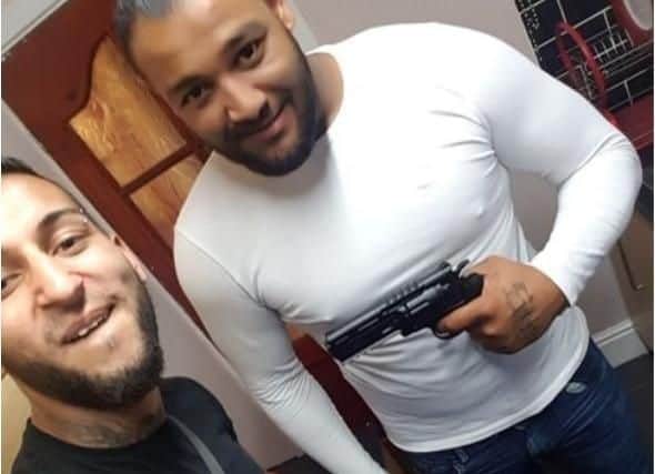 Jan Dudi and Norbert Pulko (left) with a BB gun that was shown in court during their trial. Picture: West Mercia Police/PA Wire