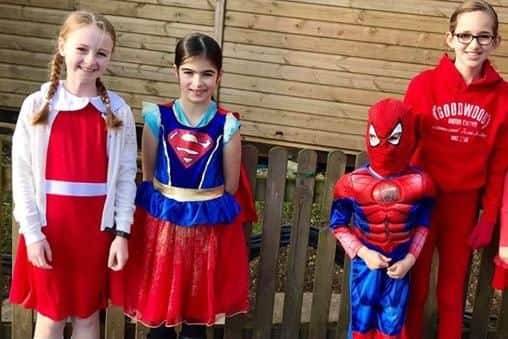 These were some of costumes at Clanfield Primary School. Including from left to right - Jessica Emily Venn, 9, as Annie, Stephanie Groves, 9, as superwoman, Henry Lamb, 5, as Spiderman and Isabella Lamb in red theme