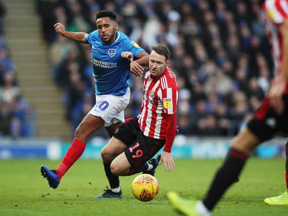 Kenny Jackett has no qualms keeping Nathan Thompson in his Pompey side, despite the contract situation. Picture: Joe Pepler