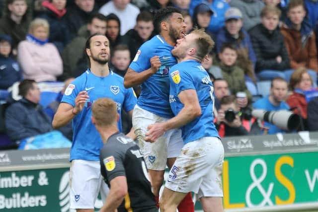 Nathan Thompson and Matt Clarke clash heads as both attempt to clear during the second half of Pompey's 5-1 win over Bradford. Picture: Simon Hill, Portsmouth Football Club/Pompey Press Photographer