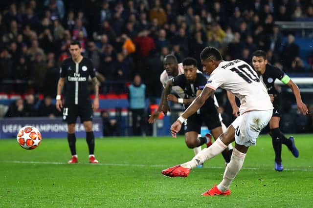 Marcus Rashford scores the late penalty for Manchester United in Paris. Picture: Julian Finney/Getty Images