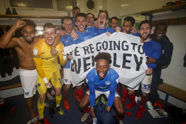 Pompey players celebrate in the changing room after winning the Checkatrade Trophy Semi Final match against Bury. Picture: Daniel Chesterton