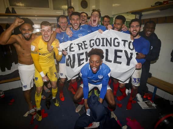Pompey players celebrate in the changing room after winning the Checkatrade Trophy Semi Final match against Bury. Picture: Daniel Chesterton