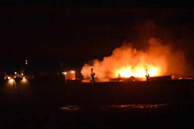 The Grande America on fire in the Bay of Biscay