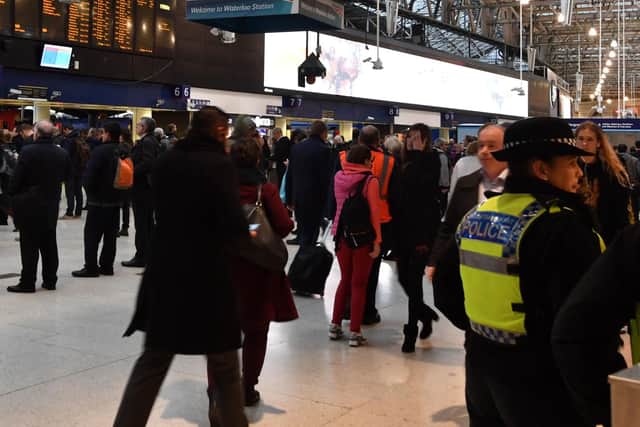 British Transport Police officers on the concourse of Waterloo Railway Station. Photo credit John Stillwell/PA Wire.