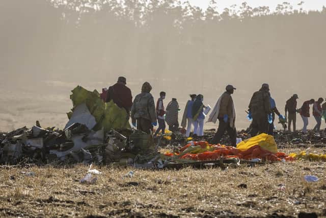 Rescuers work at the scene of an Ethiopian Airlines flight crash near Bishoftu, or Debre Zeit, south of Addis Ababa,  Ethiopia, Monday, March 11, 2019. Picture: AP Photo/Mulugeta Ayene