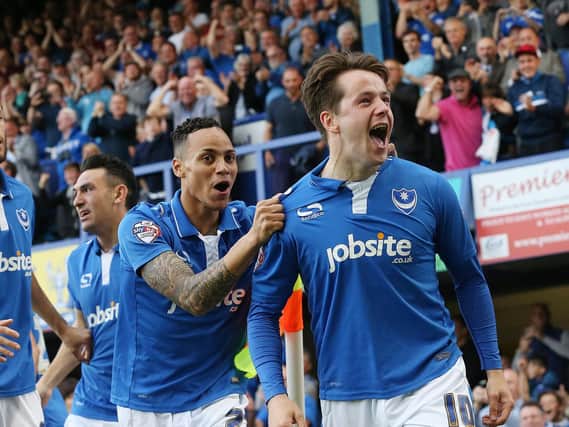 Marc McNulty celebrates scoring Pompey's opener against Plymouth in the League Two play-off semi-final first leg in May 2016. Picture: Joe Pepler