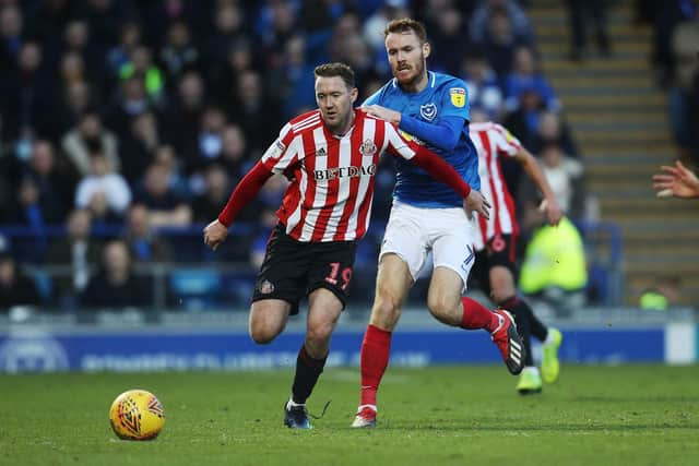 Pompey's Tom Naylor battles Sunderland winger Aiden Mcgeady for the  ball. Picture: Joe Pepler