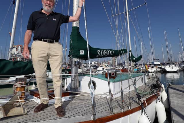 Sir Robin Knox-Johnston stands on the deck of his boat Suhaili on which he became the first person to sail non-stop around the world. Picture: Andrew Matthews/PA Wire
