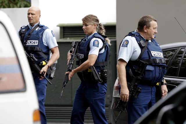 Armed police patrol outside a mosque in central Christchurch, New Zealand, Friday, March 15, 2019. A witness says many people have been killed in a mass shooting at a mosque in the New Zealand city of Christchurch. Picture: AP Photo/Mark Baker