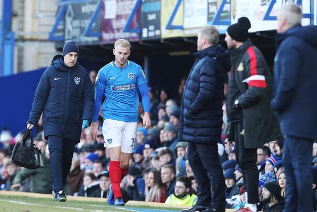 Jack Whatmough limps off against Doncaster. Picture: Joe Pepler