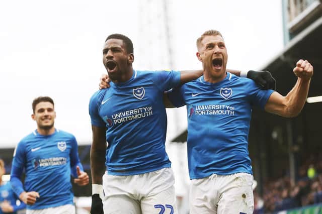 Omar Bogle and Lee Brown celebrate Pompey's opener in their 2-0 success over Scunthorpe. Picture: Joe Pepler/Digital South