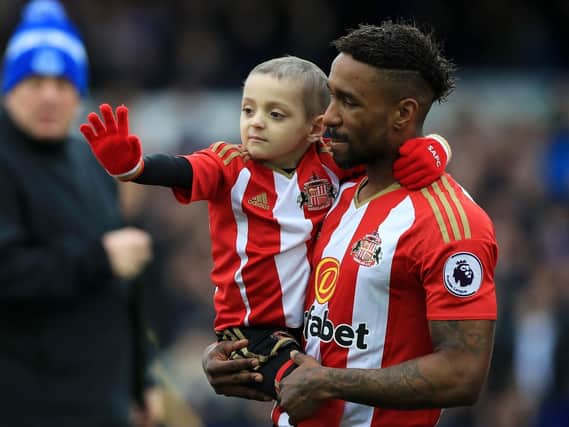 Bradley Lowery and Jermain Defoe, who formerly played for Pompey. Picture: Peter Byrne/PA Wire