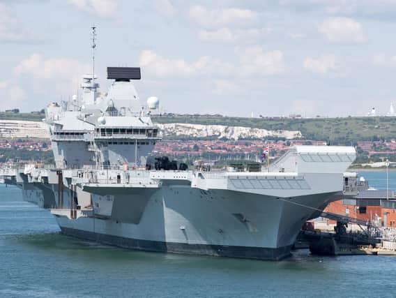 HMS Queen Elizabeth in the port. Photo by Matt Cardy/Getty Images
