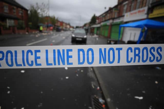 Undated file photo of police tape. Picture: Peter Byrne/PA Wire