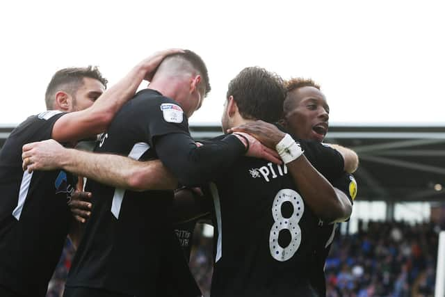 Pompey celebrate Brett Pitman's goal in their 2-0 win over Shrewsbury. Picture: Joe Pepler/Digital South.