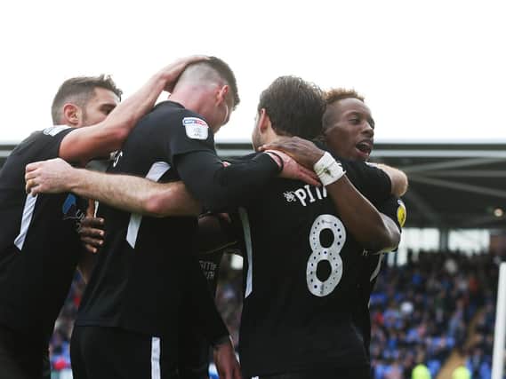 Pompey celebrate Brett Pitman's goal in their 2-0 win over Shrewsbury. Picture: Joe Pepler/Digital South.