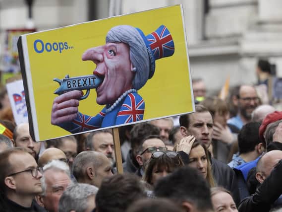 Over 5 million people have signed a petition calling for Article 50 to be revoked. Picture: AP Photo/Kirsty Wigglesworth