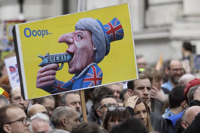 Over 5 million people have signed a petition calling for Article 50 to be revoked. Picture: AP Photo/Kirsty Wigglesworth
