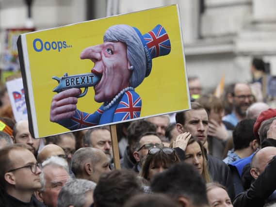 Over 5 million people have signed a petition calling for Article 50 to be revoked. Picture: AP Photo/Kirsty Wigglesworth