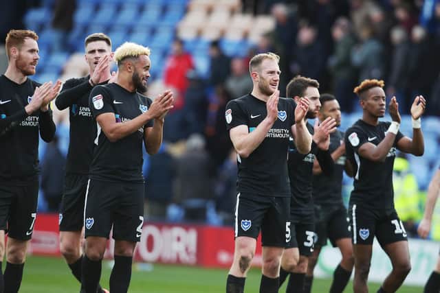 Pompey celebrate their victory at Shrewsbury. Picture: Joe Pepler
