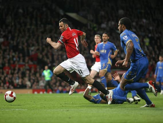 Ryan Giggs in action against Portsmouth in 2009. Picture: Mike Egerton/ EMPICS Sport/PA Photos