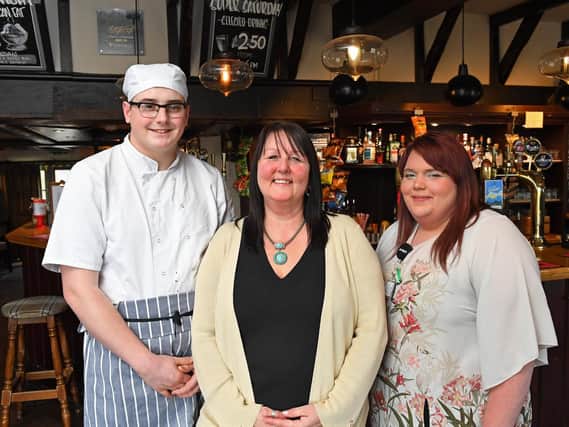 The Harvest Home
(left to right) Kingsley Thew (18) one of the chefs, Assistant Manager Chrissie Hicks (56) with Supervisor Melissa Munks (24) 
Picture by:  Malcolm Wells (190320-5263)