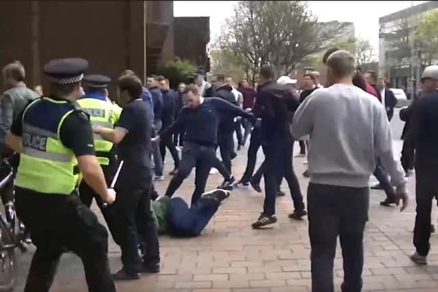 Stills from body-worn police cameras during violence before the Pompey Plymouth game in 2017. Eight men were jailed.