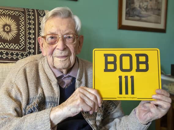 Bob Weighton, from Alton, with his personal number plate for his mobility scooter as he turns 111 years old. Picture: Steve Parsons/PA Wire