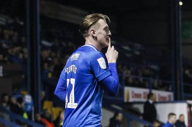 Ronan Curtis celebrates his goal at Bury in the Checkatrade Trophy semi-final. Picture: Daniel Chesterton/phcimages.com