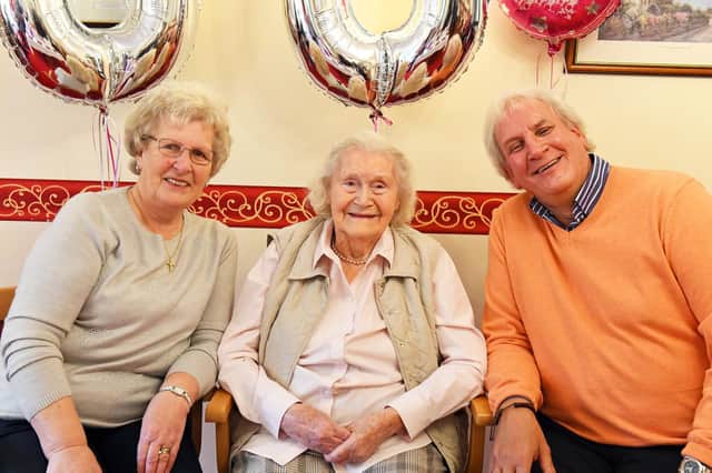 Birthday girl Olive with her niece Pam Silvester, left, and nephew Peter Barker. Picture by: Malcolm Wells (190320-5317)