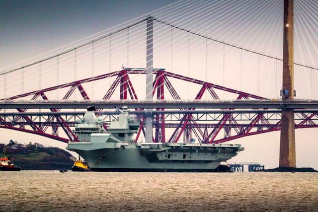 HMS Queen Elizabeth has returned to Rosyth, where she will be reunited with HMS Prince of Wales her sister ship, for planned maintenance work.