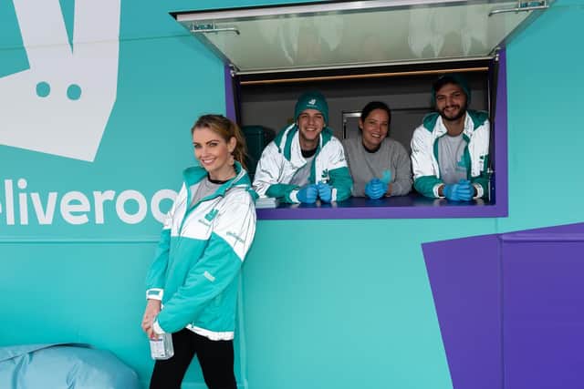Deliveroo team members ready to serve free food. From left, Laura Dainton, Jake Vanderlet, Jess Dowdall and Dan Girdler. Picture: Vernon Nash (060419-019)