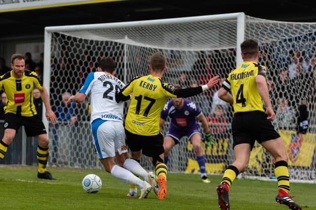 Alfie Rutherford is fouled for the penalty. Picture: Vernon Nash