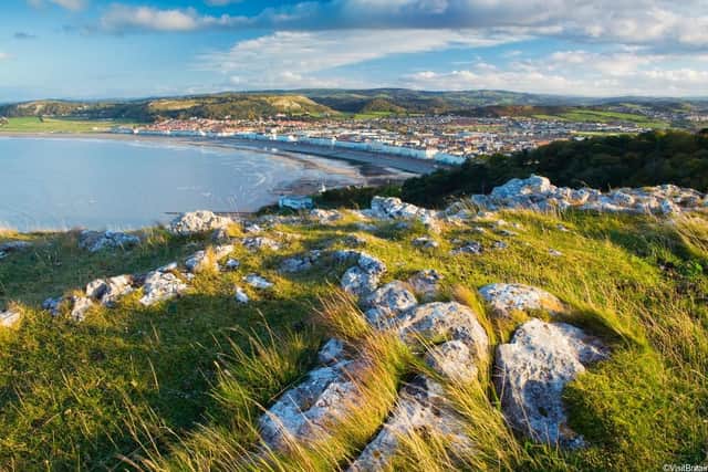 View from the top of the limestone headland ridge The Great Orme, to Llandudno historic seaside resort and waterfront in North Wales.
VisitBritain/ Lee Beel;