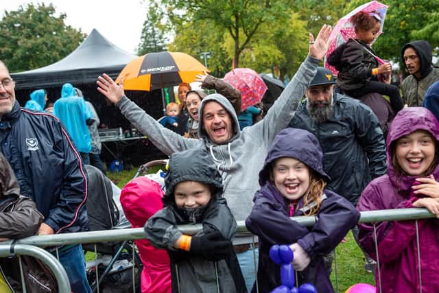 Festivalgoers make the most of Charmed Life in 2018 despite the bad weather. Picture: Vernon Nash (180434-021)