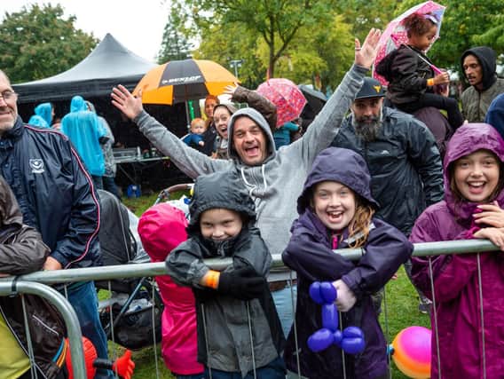 Festivalgoers make the most of Charmed Life in 2018 despite the bad weather. Picture: Vernon Nash (180434-021)