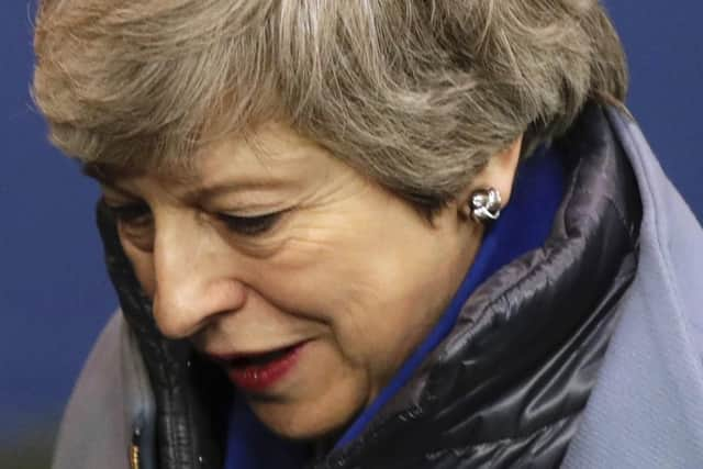 British Prime Minister Theresa May leaves at the conclusion of an EU summit in Brussels, Thursday, April 11, 2019. Picture: (AP Photo/Olivier Matthys)