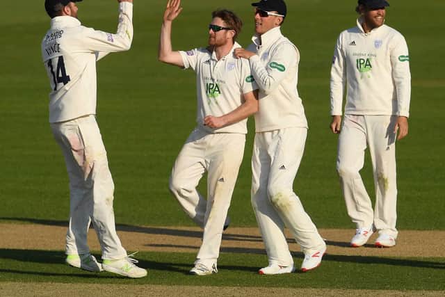 Liam Dawson celebrates bowling Joe Root against Hampshire. Picture: Mike Hewitt/Getty Images