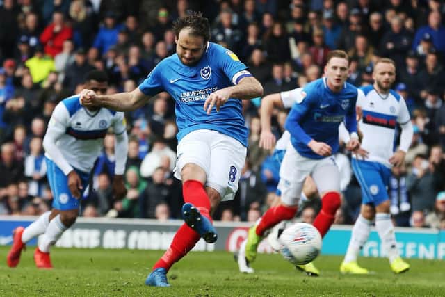 Brett Pitman scores from the penalty spot against Rochdale. Picture: Joe Pepler