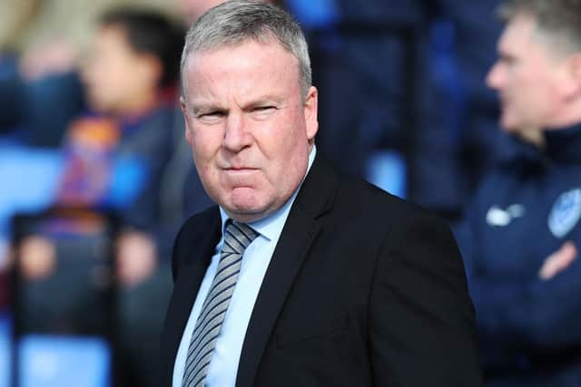Kenny Jackett is bidding for his promotion-chasing Pompey to avoid becoming Burton's latest scalp. Picture: Joe Pepler
