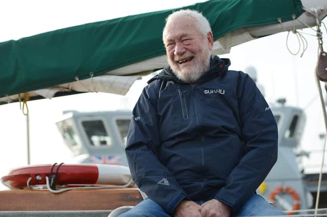 Sir Robin on board Suhaili before departure this morning in Portsmouth Harbour.  Picture: Morten Watkins/Solent News & Photo Agency
