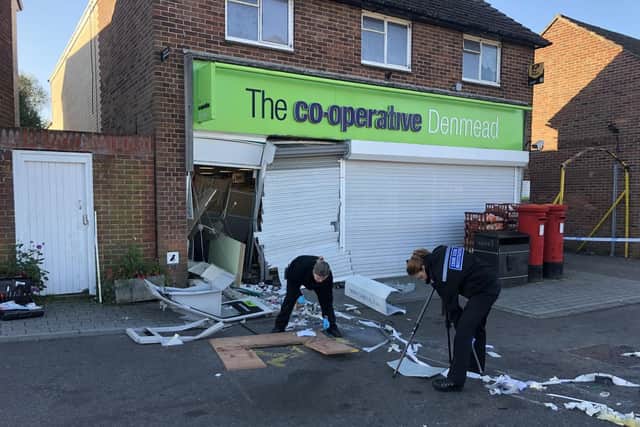 Forensics officers at Co-op in Hambledon Road in Denmead on October 3 2018 after a cash machine was ripped from the building. Picture: Tamara Siddiqui