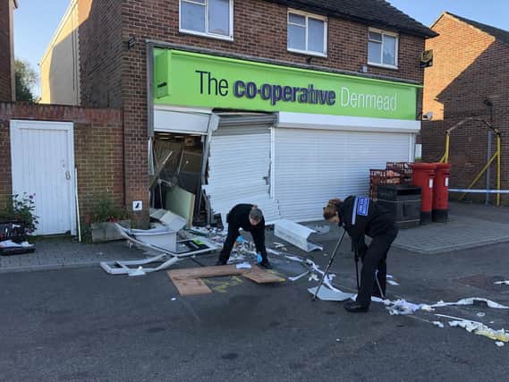 Forensics officers at Co-op in Hambledon Road in Denmead on October 3 2018 after a cash machine was ripped from the building. Picture: Tamara Siddiqui