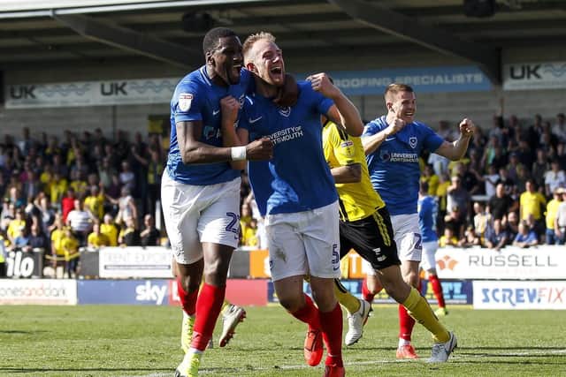 Matt Clarke celebrates after earning Pompey a last-gasp winner at Burton. Picture: Daniel Chesterton/phcimages.com