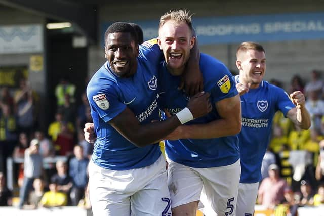 Matt Clarke, right, celebrates his late winner with Omar Bogle. Picture: Joe Pepler