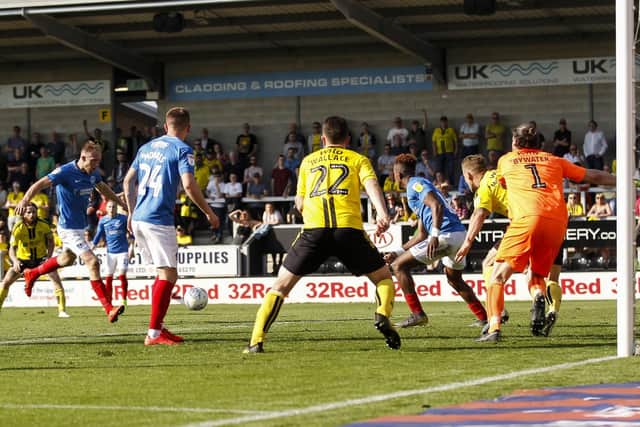 Matt Clarke nets Pompey's stoppage-time winner at Burton. Picture: Daniel Chesterton/phcimages.com